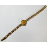 A small ladies 9ct gold cased watch & strap 8.7g