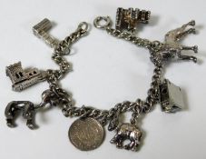 A silver charm bracelet 37g