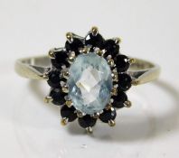 A 9ct yellow gold ring. later plated (some wear to plate) set with sapphire & topaz 3.4g size S