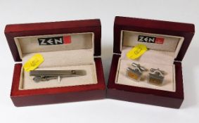 A boxed Zen tie clip & cufflinks, both items set w
