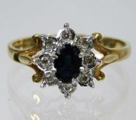 A 9ct gold ring set with diamond & sapphire 2.2g s