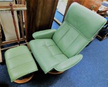 An Ekornes "Stressless Recliner" with stool. Prove