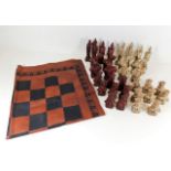 A Chinese chess set with Oriental styled pieces wi