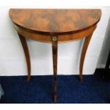 A D shaped hall table with tapered legs 28in high