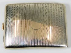 A silver cigarette case 125g