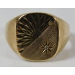 A 9ct gold men's signet ring with small moissanite