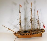 A wooden model of ship 32in long x 28in high. Prov