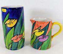 Two hand painted Honiton pottery jugs, tallest 8in