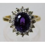 A 18ct gold ring set with amethyst & approx. 0.34c