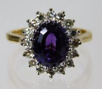 A 18ct gold ring set with amethyst & approx. 0.34c