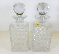 A pair of cut matching glass decanters. Provenance