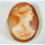 A yellow metal, tests as 15ct gold, mounted cameo