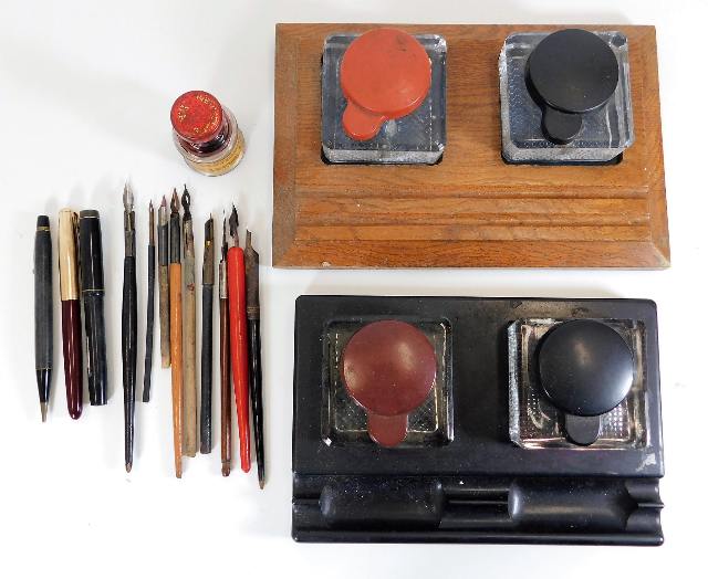 Two table inkwell sets including bakelite & a sele