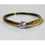 A 14ct gold ring set with 0.1ct diamond 1g size M/