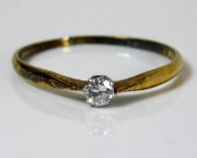 A 14ct gold ring set with 0.1ct diamond 1g size M/