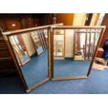 Two wooden framed mirrors with metal corners 44in