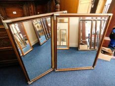 Two wooden framed mirrors with metal corners 44in