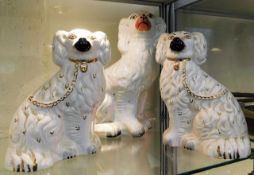 A pair of Royal Doulton Staffordshire style dogs & one Victorian.