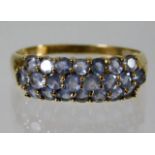 A 9ct gold ring set with blue spinels 2.3g size S