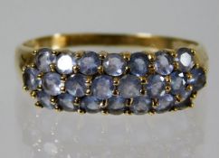 A 9ct gold ring set with blue spinels 2.3g size S