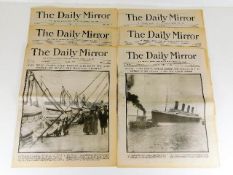 Six vintage reproduction copies of Daily Mirror fe