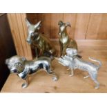 Three brass dog figures including seated greyhound