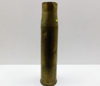 A brass shell casing stick stand