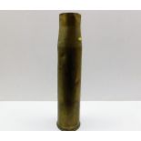 A brass shell casing stick stand