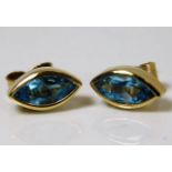 A pair of 9ct gold earrings set with topaz 1.6g