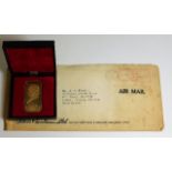 A cased Winston Churchill gold plated silver ingot