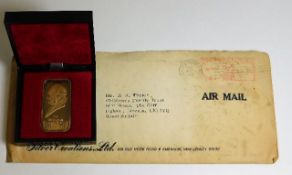A cased Winston Churchill gold plated silver ingot
