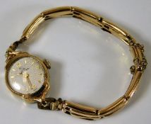 A ladies Record 9ct gold cased watch with plated s