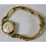A ladies Record 9ct gold cased watch with plated s
