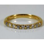 An 18ct gold half eternity ring set with 0.36ct di