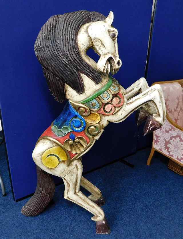 A large painted carved fairground style horse appr