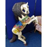 A large painted carved fairground style horse appr