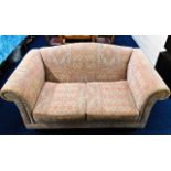 A good quality upholstered two seater jacquard sof