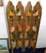 A painted four piece folding screen depicting bird