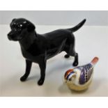 A Beswick labrador dog twinned with a Royal Crown