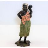 An early 20thC. cold painted spelter figure of wom