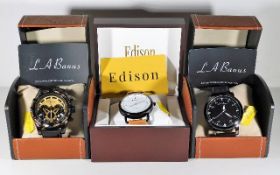 Three boxed fashion watches, one a/f