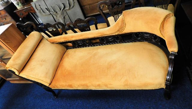 An upholstered chaise longue 69in long