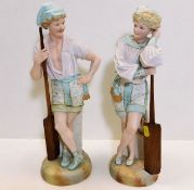 A pair of c.1900 bisque porcelain figures of boy &