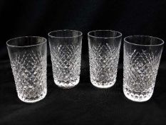 A set of four Waterford crystal cut glass tumblers