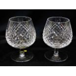 A pair of Waterford crystal cut glass brandy glass