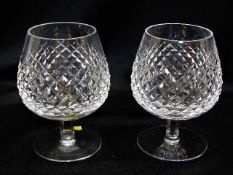 A pair of Waterford crystal cut glass brandy glass