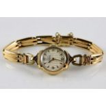 A ladies Record wristwatch with 9ct gold case & pl
