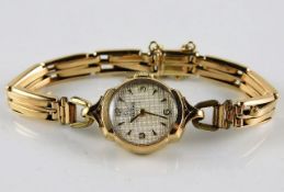 A ladies Record wristwatch with 9ct gold case & pl