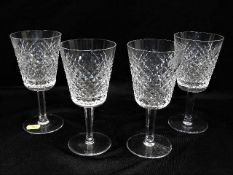 A set of four Waterford crystal cut glass wine gla