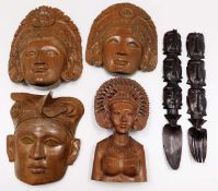 Four Balinese carved masks & busts twinned with tw